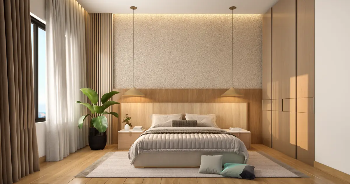 A bedroom with a timber headboard wall, fitted wardrobes along one side and a window to the balcony.